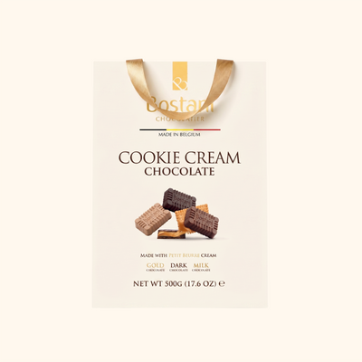 Front of the Bostani Cookie Cream Chocolate 500 g gift bag in gold, dark and milk