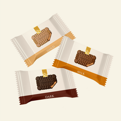 Individually wrapped Butter Biscuit Chocolate pieces in gold, milk and dark chocolate