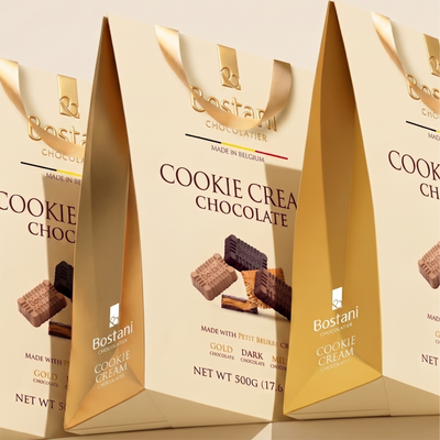Bostani Cookie Cream Chocolate gift bags on a gold background