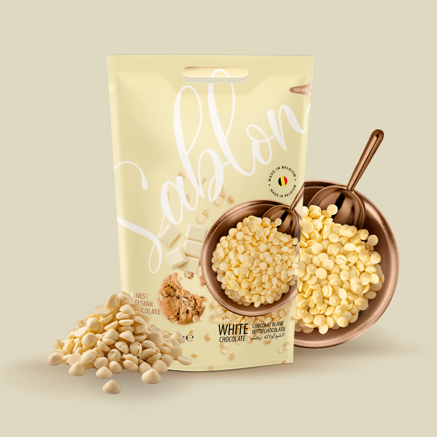 Bostani Sablon white Belgian chocolate chips bag with a bowl of chips