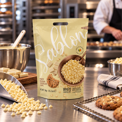 Sablon white chocolate chips bag in a bakery kitchen with cookies